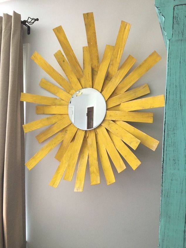 espejo de sol para decorar la pared a partir de una cesta de manzanas