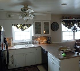 q repainting kitchen cabinets , kitchen cabinets, kitchen design, painting, painting cabinets, U shape kitchen Walls are taupe I would love to have a different light fixture but DH NEEDS a fan