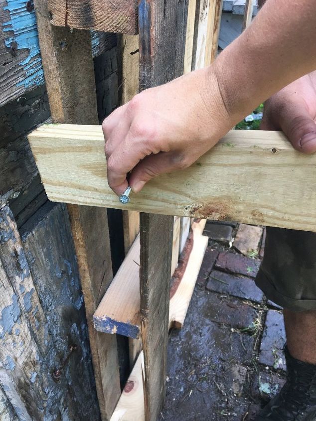 outdoor garbage can storage from pallets