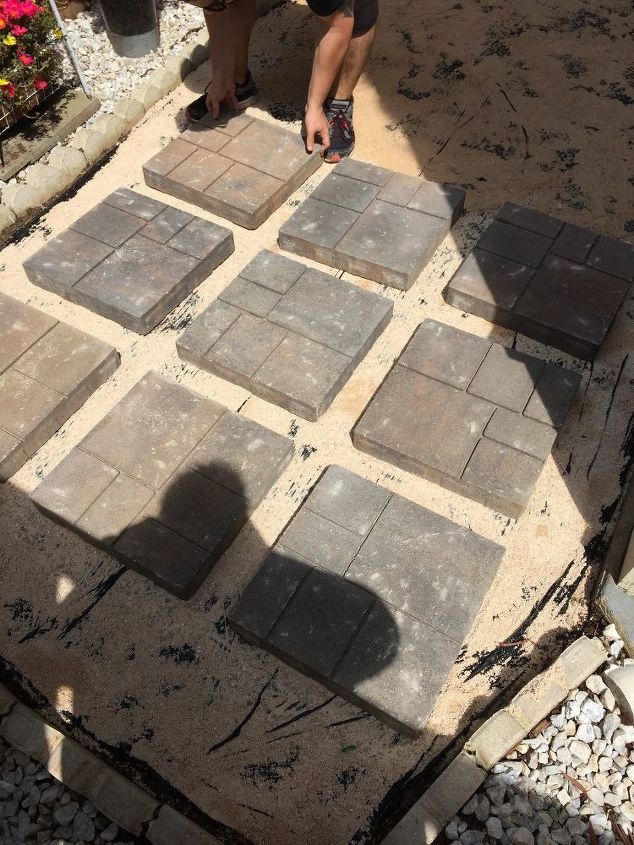 A husband and wife buy 18 paving stones at Home Depot for the best