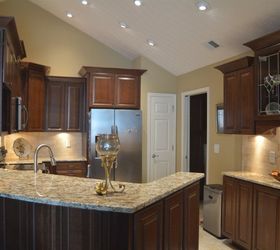 smaller kitchen in a retirement area with a punch , countertops, kitchen cabinets, kitchen design