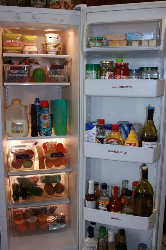 s 11 storage hacks that will instantly declutter your kitchen, kitchen design, organizing, storage ideas, Label the compartments in your fridge