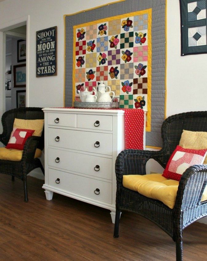 s how 15 creative people fill their empty walls, wall decor, Hang a homemade quilt