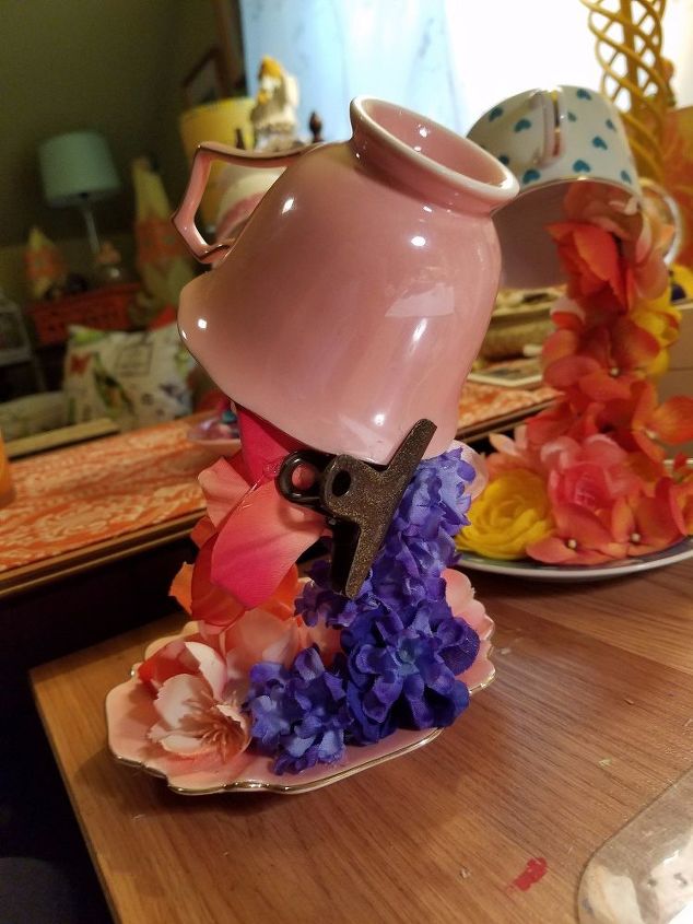 overflowing teacups with silk flowers, crafts, repurpose household items