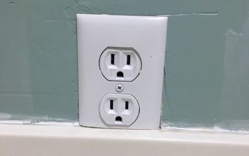Update Discolored Outlets With Spray Paint