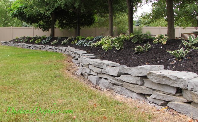 diy stacked stone garden wall, concrete masonry, landscape, outdoor living