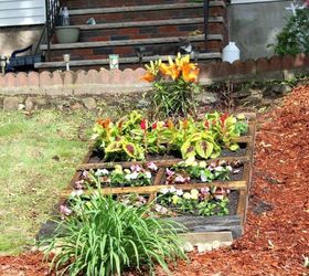 here s what people are doing with their sloped backyards, Place a pallet garden