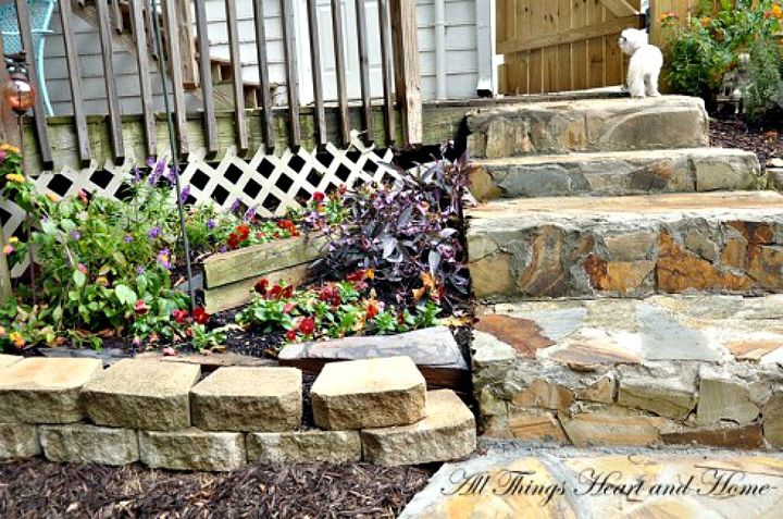 here s what people are doing with their sloped backyards, Add stone steps for a cottage feel