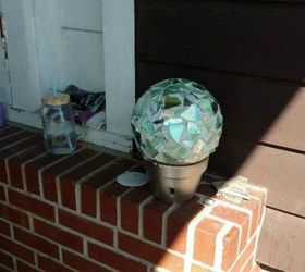 s 15 brilliant things to do with your old cds, repurposing upcycling, Use a broken one for sparkling garden decor