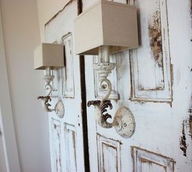 13 homemade wall sconces that double as wall decor, Paint it washed white for an antique feel