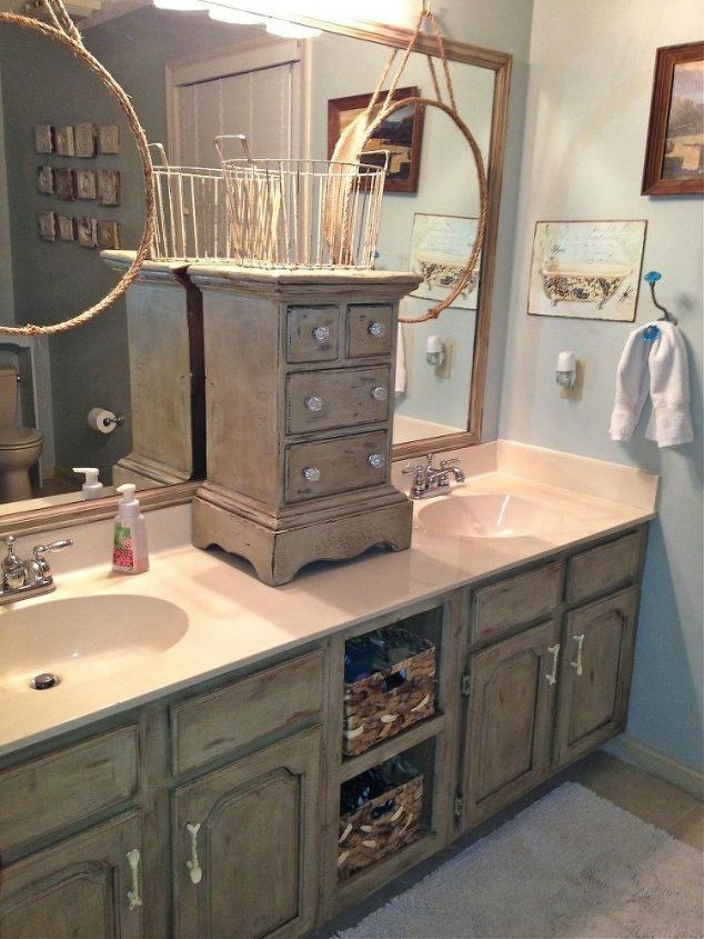 11 ways to transform your bathroom vanity without replacing it, Place a small cabinet to separate the sinks
