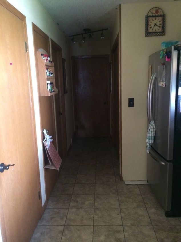 q my kitchen and i need your help can you give some very cheap ideas , countertops, kitchen cabinets, kitchen design, Hallway of doors Laundry is behind wall on left Master at end of hall Then the garage basement outsiee door pantry bathroom along the West left wall