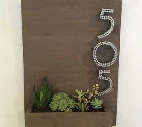11 charming ways to add your address sign to your garden, Use nails to make your house number pop
