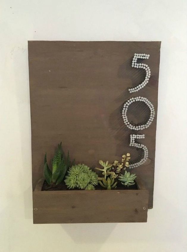 11 charming ways to add your address sign to your garden, Use nails to make your house number pop