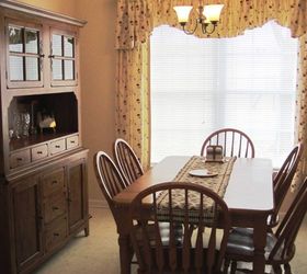 q should i paint or stain my kitchen cabinets, kitchen cabinets, kitchen design, painting, painting cabinets, The eat in dining area of my home s kitchen with an oak farmhouse table and oak china cabinet
