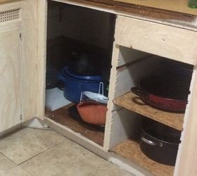 q what can i do to these cabinets for pan storage, kitchen cabinets, organizing, storage ideas