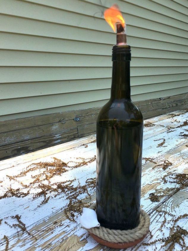 s hostess hacks every homeowner should know, Turn wine bottles into awesome tiki torches