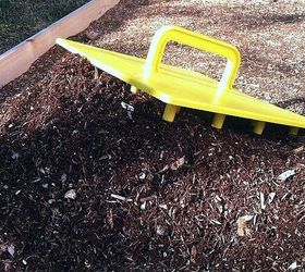 fastest way to plant a raised garden bed, gardening, raised garden beds, Use the Stamp as a trowel to spread the soil evenly
