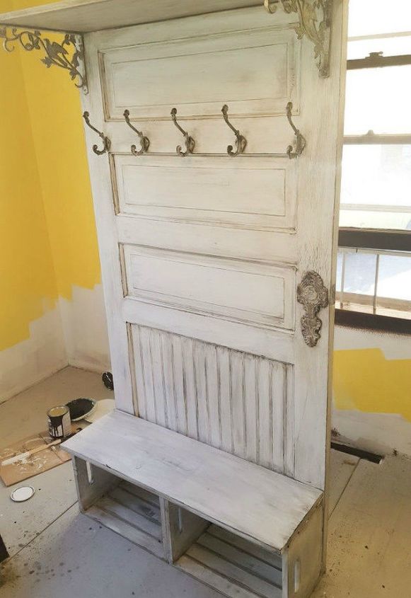 15 brilliant ways to upcycle old doors, Add crates to make the coolest mudroom