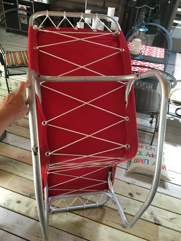 q looking for info and possibly age of this chair, home decor, home decor id, back view with lacing and grommets on cover