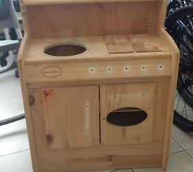 q does anyone have any ideas for this children kitchenette set , crafts, repurpose unique pieces, repurposing upcycling, I m not sure what to do with the hole in the top that had a metal bowl for the sink Also what to do with the hole in the cabinet door