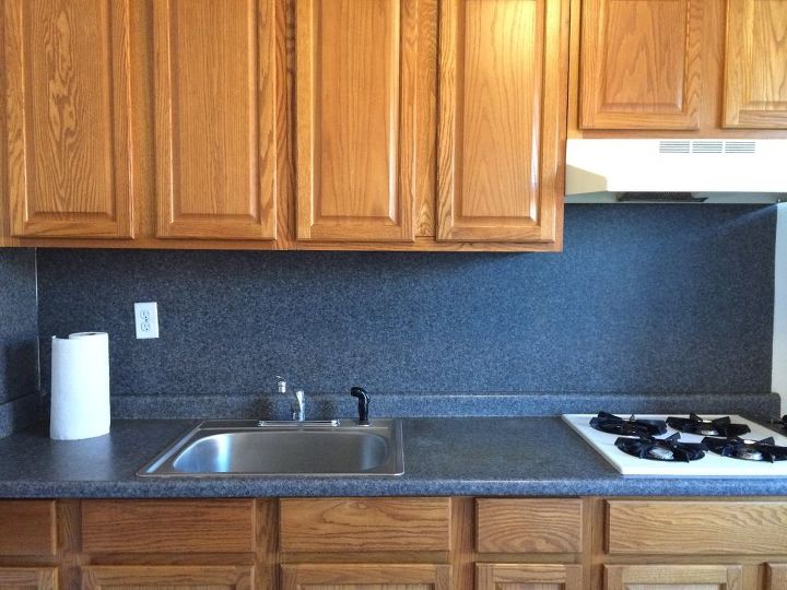 how to cover up this blue laminate backsplash, To much blue on the backsplash What color would you use to go with the blue