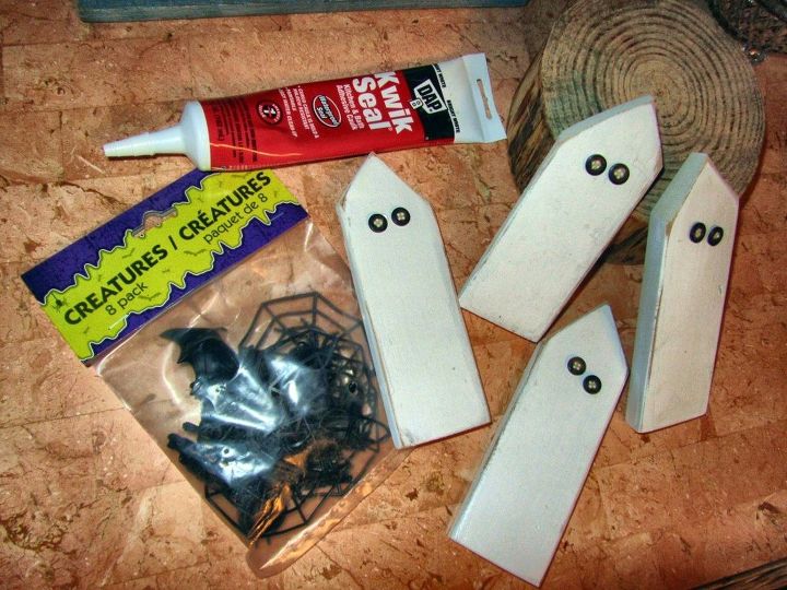 simple halloween recycled ghost in the graveyard, crafts, halloween decorations, how to, painting, seasonal holiday decor, Add button eyes