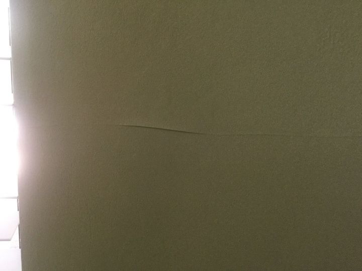 painting over wallpaper, Apparently they patched the wallpaper here