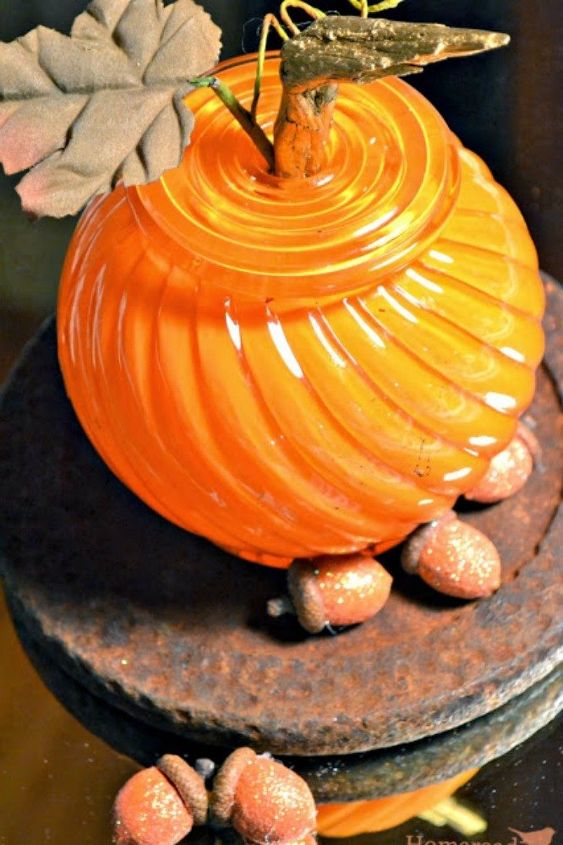 why everyone is loving these cheap glass globes, They can even be painted fun pumpkin colors
