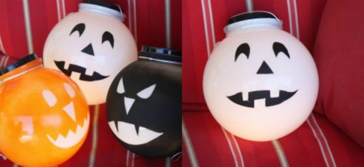 why everyone is loving these cheap glass globes, They make simple smiling jack o lanterns