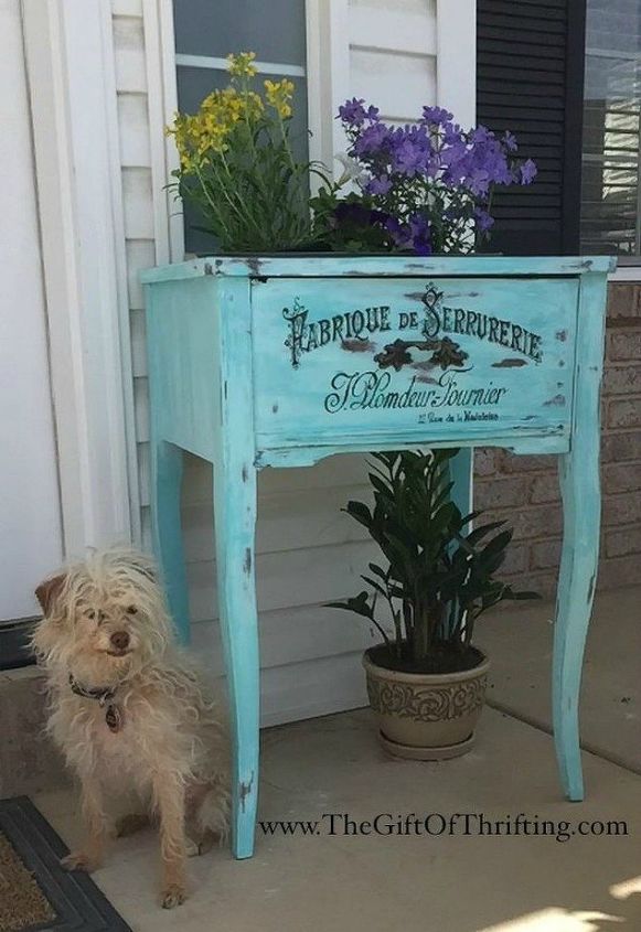 s 12 wildly creative ways to use your old sewing table, painted furniture, Turn it into a planter box for your porch