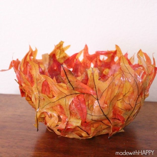 s 10 easy breezy ways to bring fall into every room, home decor, seasonal holiday decor, Place Leaves on a Ballon for This Bowl Idea