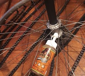 bicycle wheel and chain chandelier