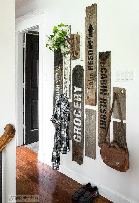 if your stairway walls are empty here s what you re missing, A staggering effect of rustic fence boards