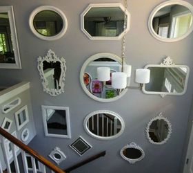 if your stairway walls are empty here s what you re missing, A gallery of different shaped mirrors