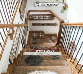if your stairway walls are empty here s what you re missing, A collection of rustic painted signs