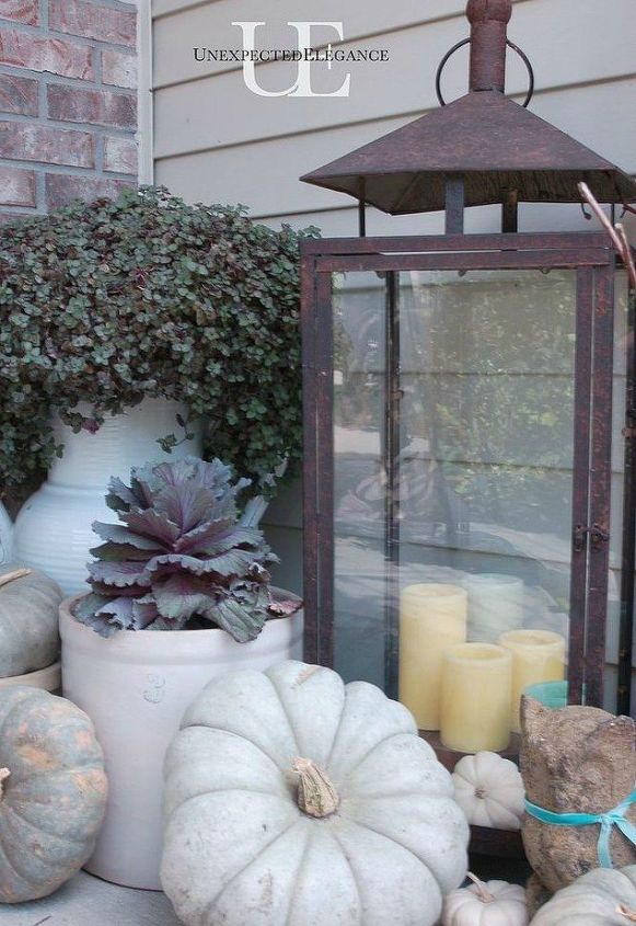 s these 17 fall porch ideas will give you that yummy warm feeling, porches, The rusted candle holder in the corner