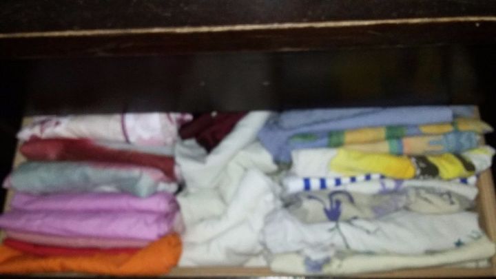 q best ways to fold bedding , organizing, Here are the pillowcases There is actually some unused space in the middle at the back so if I refold them all one third the width of the drawer everything should fit
