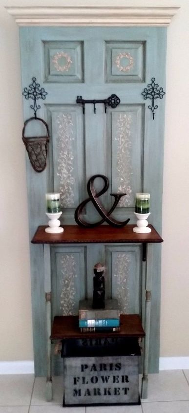 old door transformed to hall tree coat rack