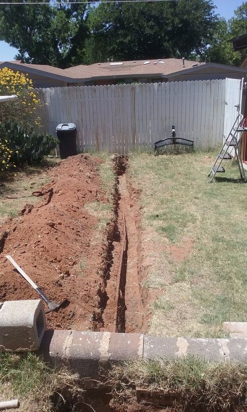 don t cut the concrete slab drill a tunnel under it instead, Te easy part old fashioned shovel work