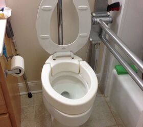 homemade toilet seat, This is what I spent 60 on at medical store It has the raised or elevated portion which is hinged