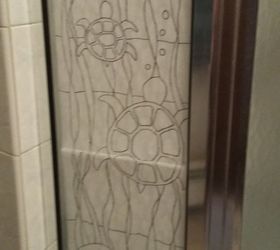 turning plain glass into faux stained glass, I first drew my design hung it on the inside