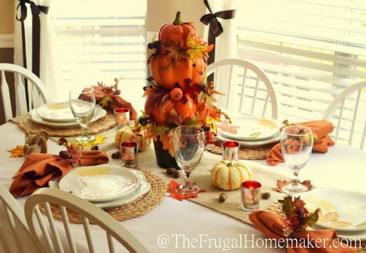 s 14 topiary techniques that are insanely popular this fall, gardening, Placing stacked pumpkins into a pot