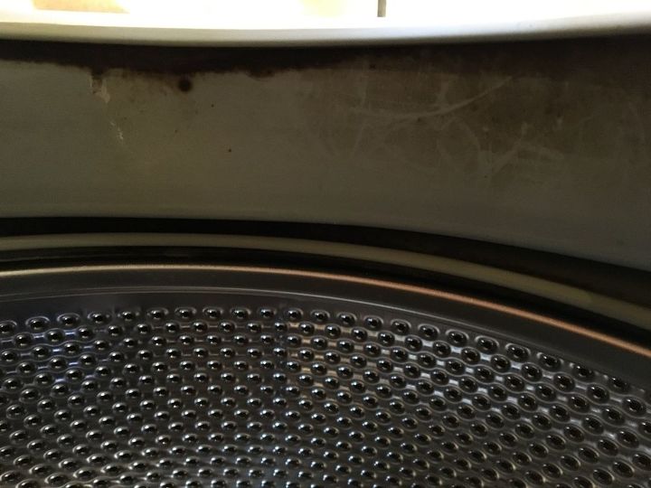 how do i clean the inside of my washing machine, Can I get this black stuff off