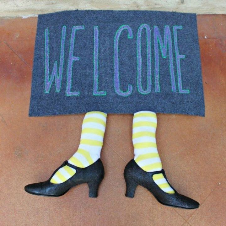 s make your neighbors giggle with these 10 hilarious halloween ideas, halloween decorations, seasonal holiday decor, Make a witch welcome mat for your front door