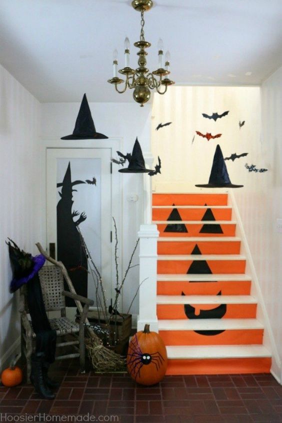 s make your neighbors giggle with these 10 hilarious halloween ideas, halloween decorations, seasonal holiday decor, Decorate your stairs into a jack o lantern