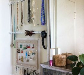 s 11 space saving hacks for your tiny bathroom, bathroom ideas, Hang tension rods in place of a jewelry box