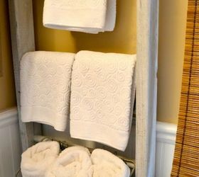 s 11 space saving hacks for your tiny bathroom, bathroom ideas, Hang a ladder on your wall for towels