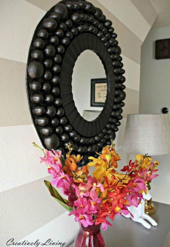 s impress your guests with these expensive looking entryway ideas, Hang up a statement mirror