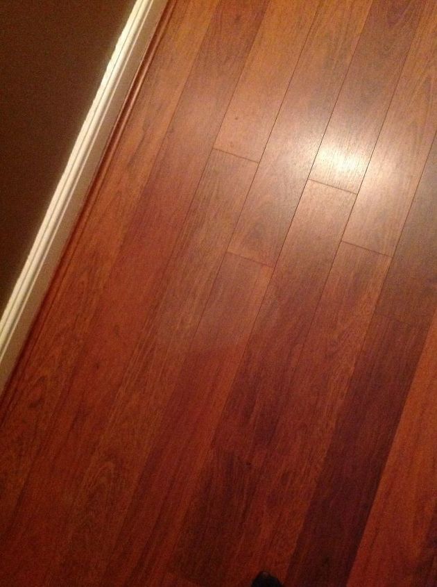 q heat mark on laminate floor, flooring, home maintenance repairs, minor home repair, Don t know if you will be able to make out the White Heat mark